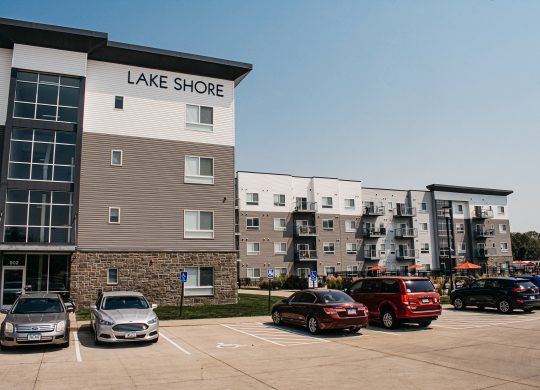 Lake Shore Apartment outside of building with parking lot visible